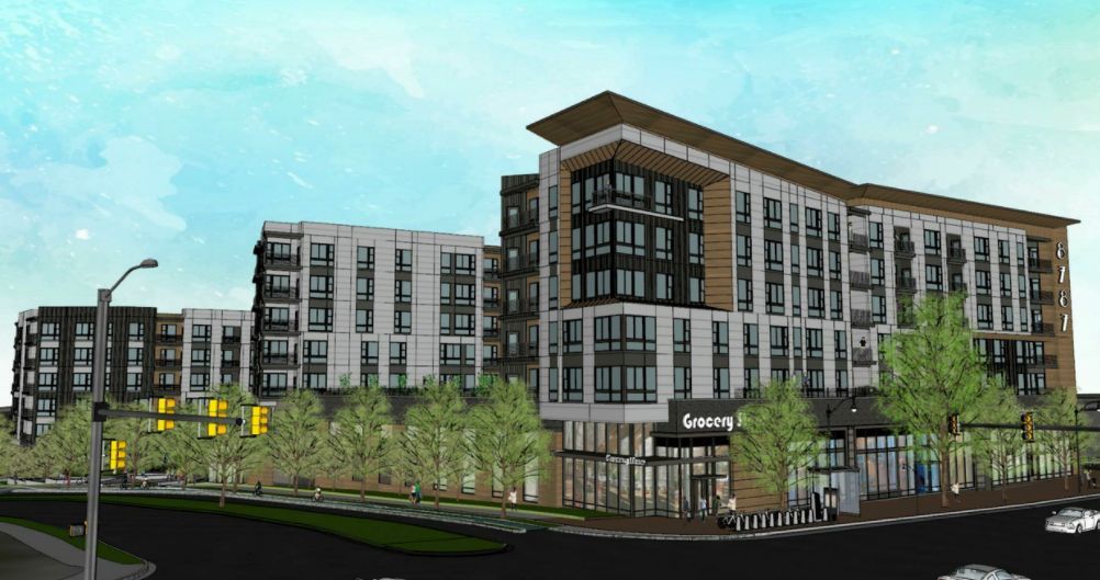 Modern multi-story residential building with greenery and urban infrastructure.