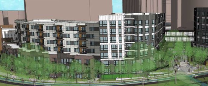 Modern multi-story residential building surrounded by greenery.