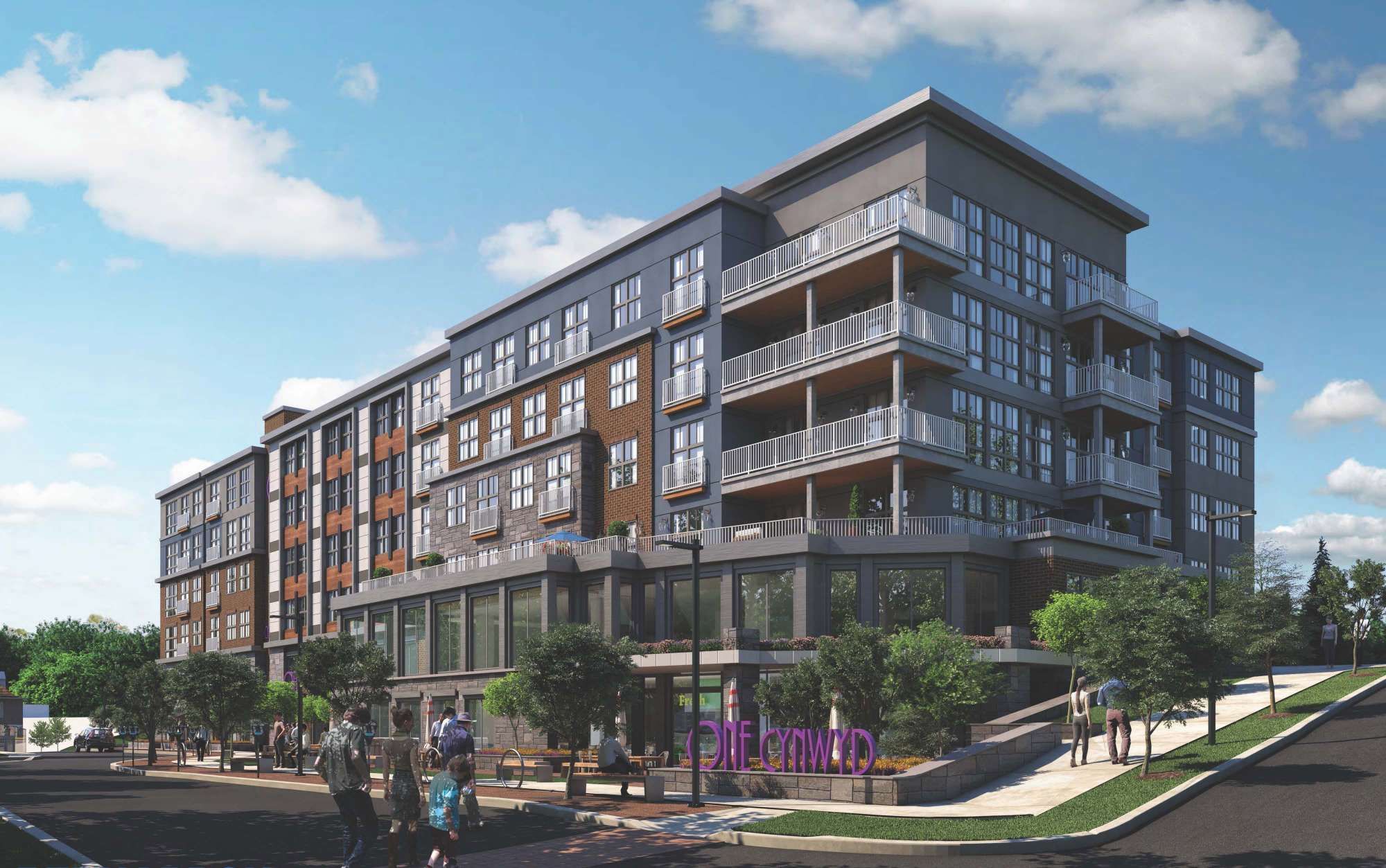 Modern multi-story apartment building with balconies and landscaping.