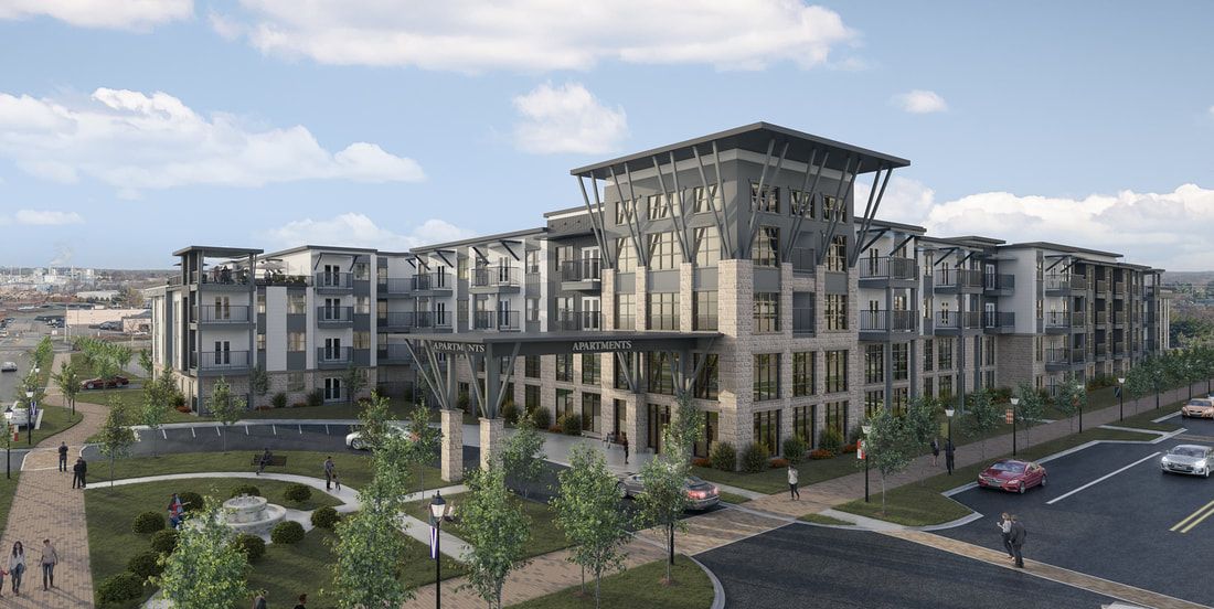 Modern apartment building with landscaped grounds and clear blue sky.