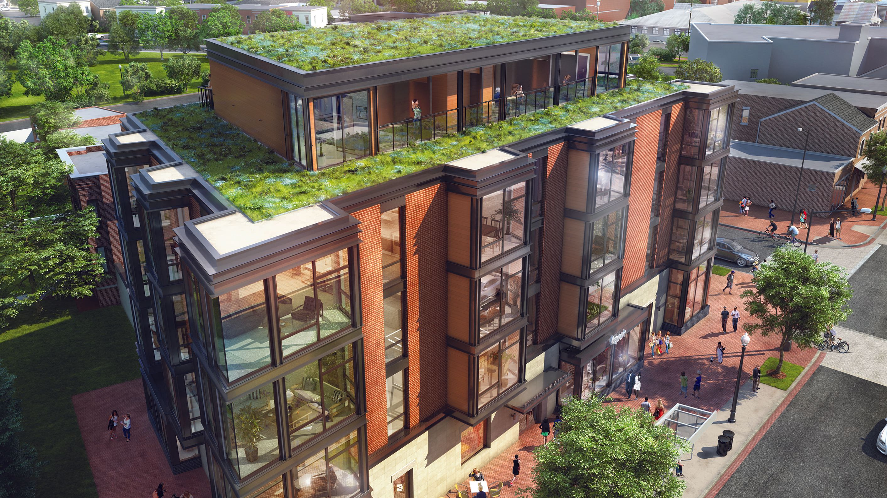 Modern building with a green roof in an urban setting.