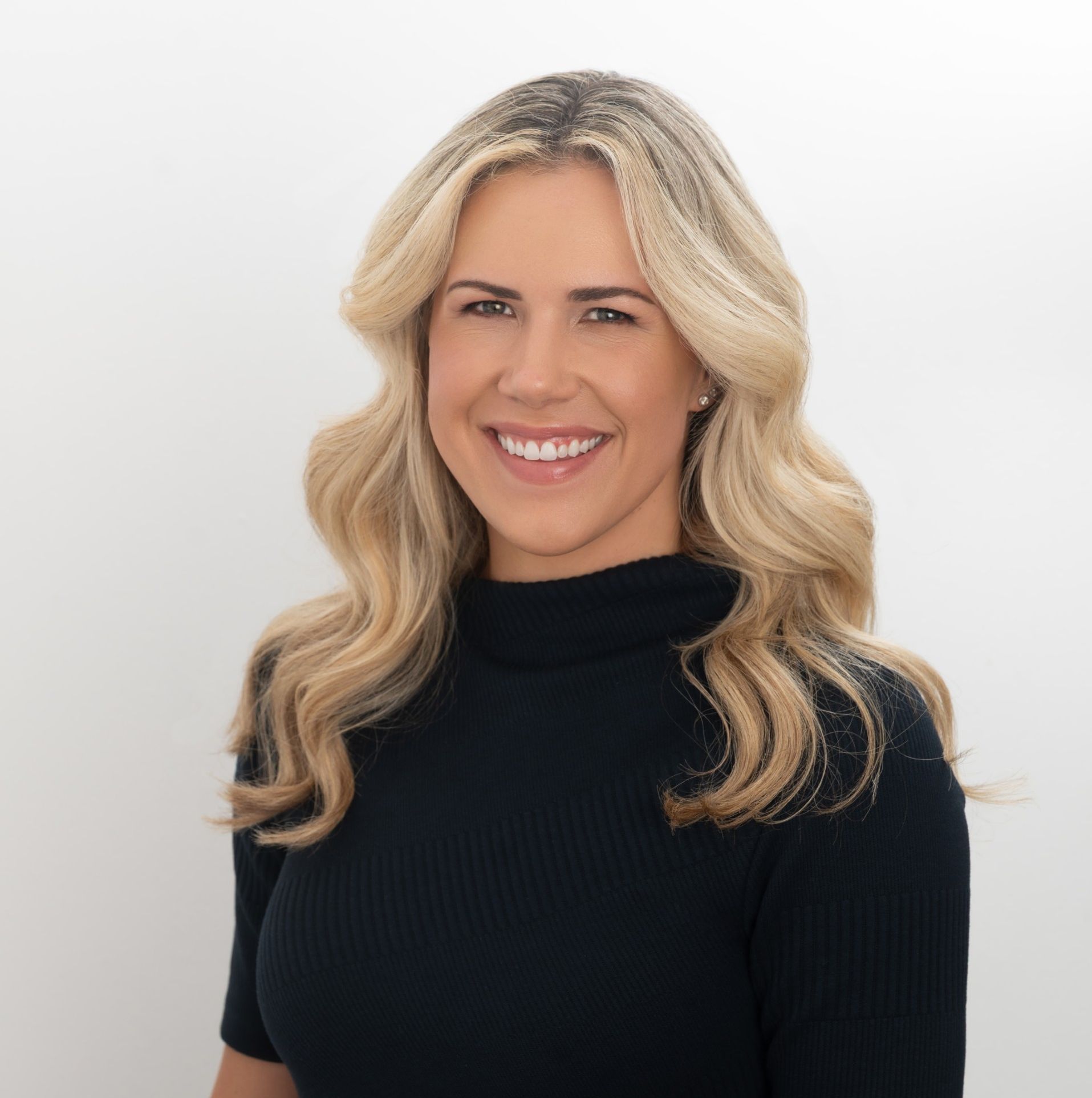 Headshot of Erin Carney, Managing Director of Client Services