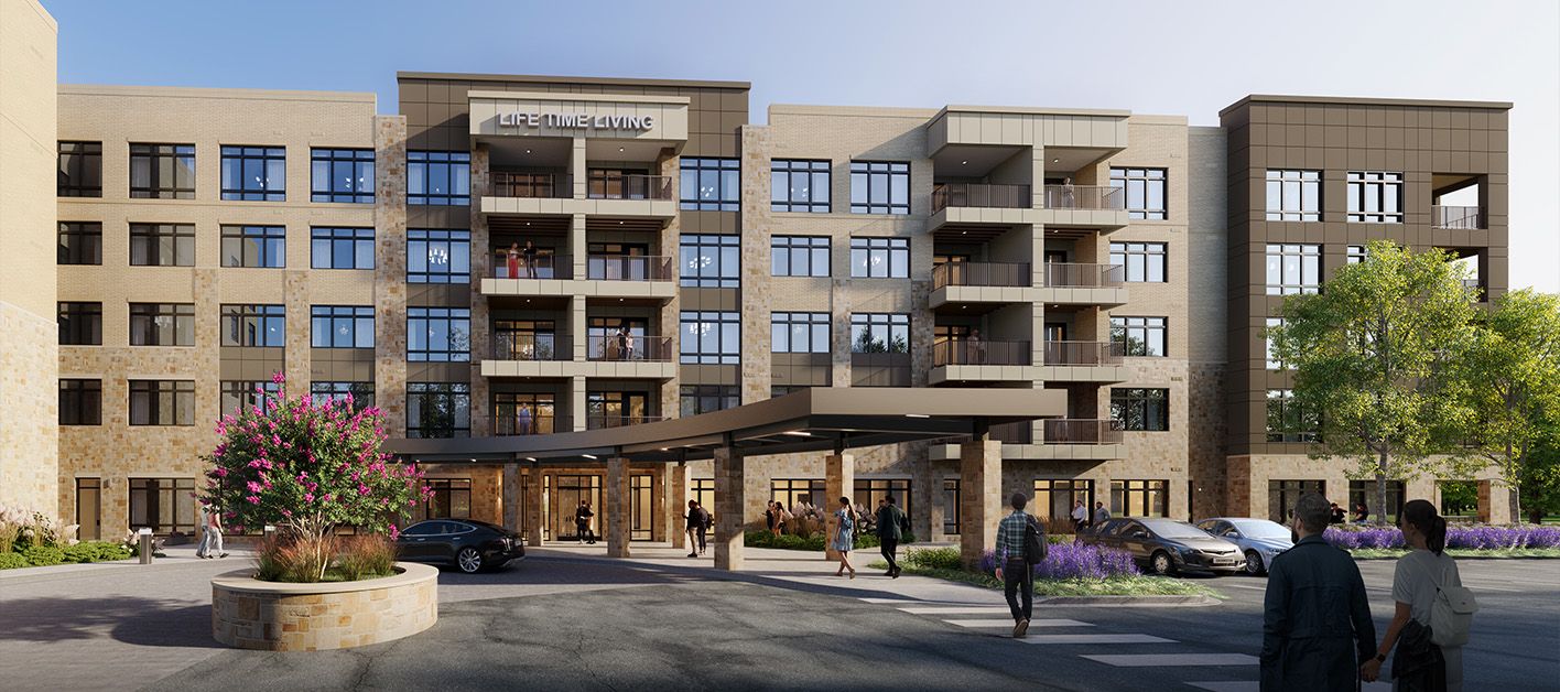 Modern multi-story building with balconies, surrounded by greenery and a welcoming entrance.