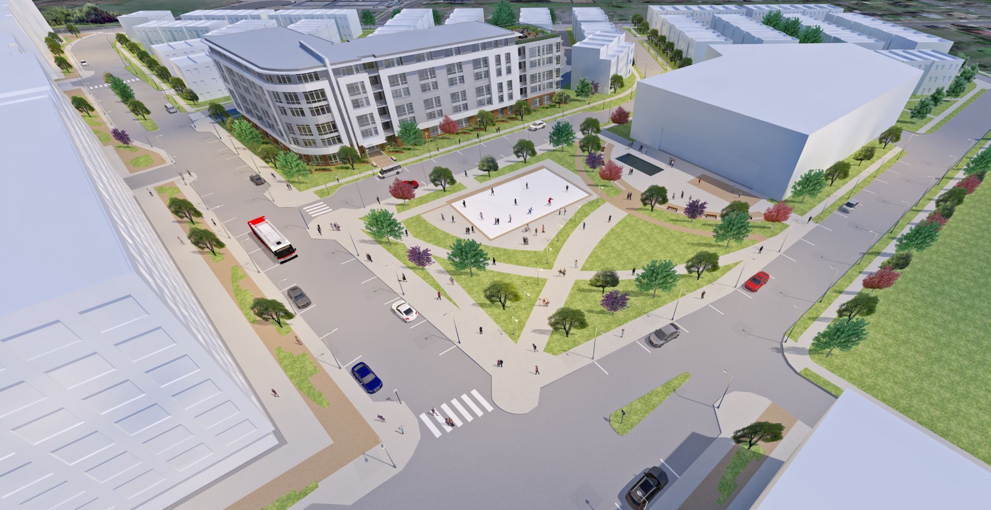 Aerial view of a modern urban development with buildings and green spaces.