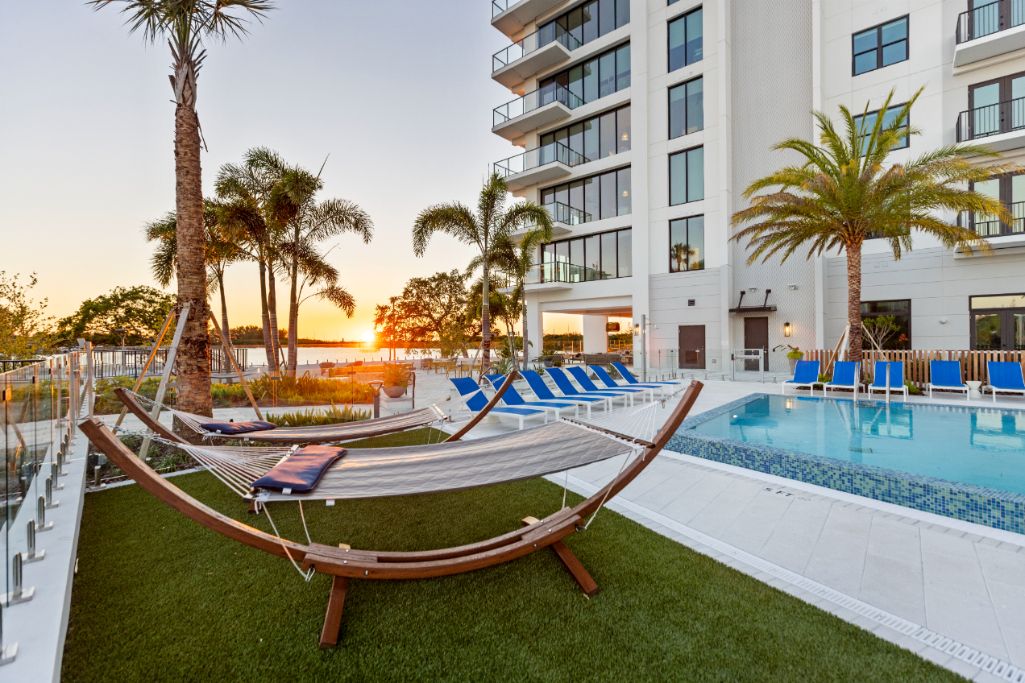 NOVEL Beach Park pool sunset with hammock