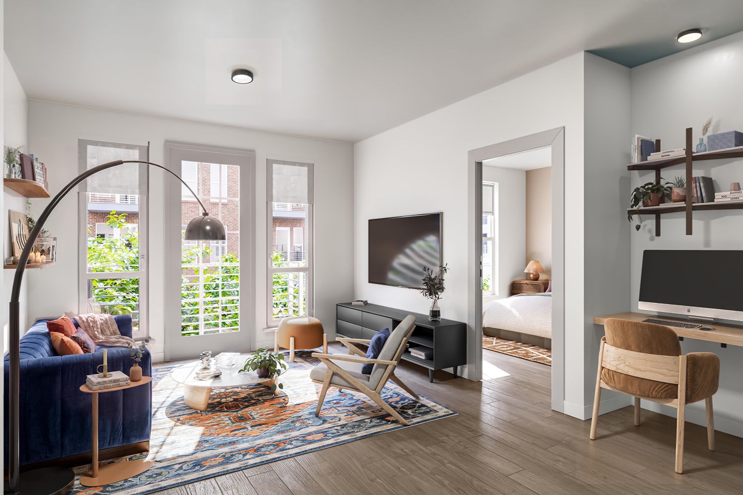 Modern living room with blue sofa, wooden furniture, and large windows.