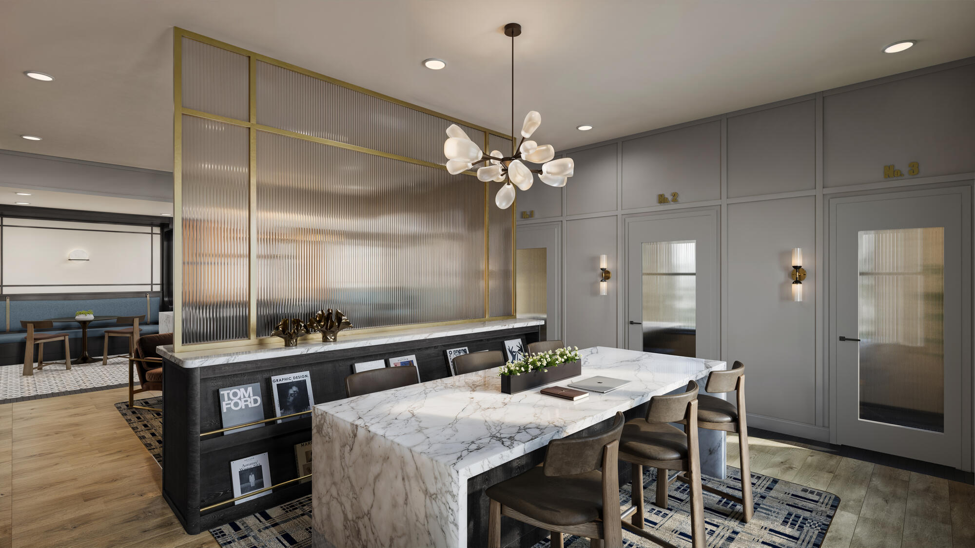 A brightly lit coworking lounge with a mix or private and communal spaces