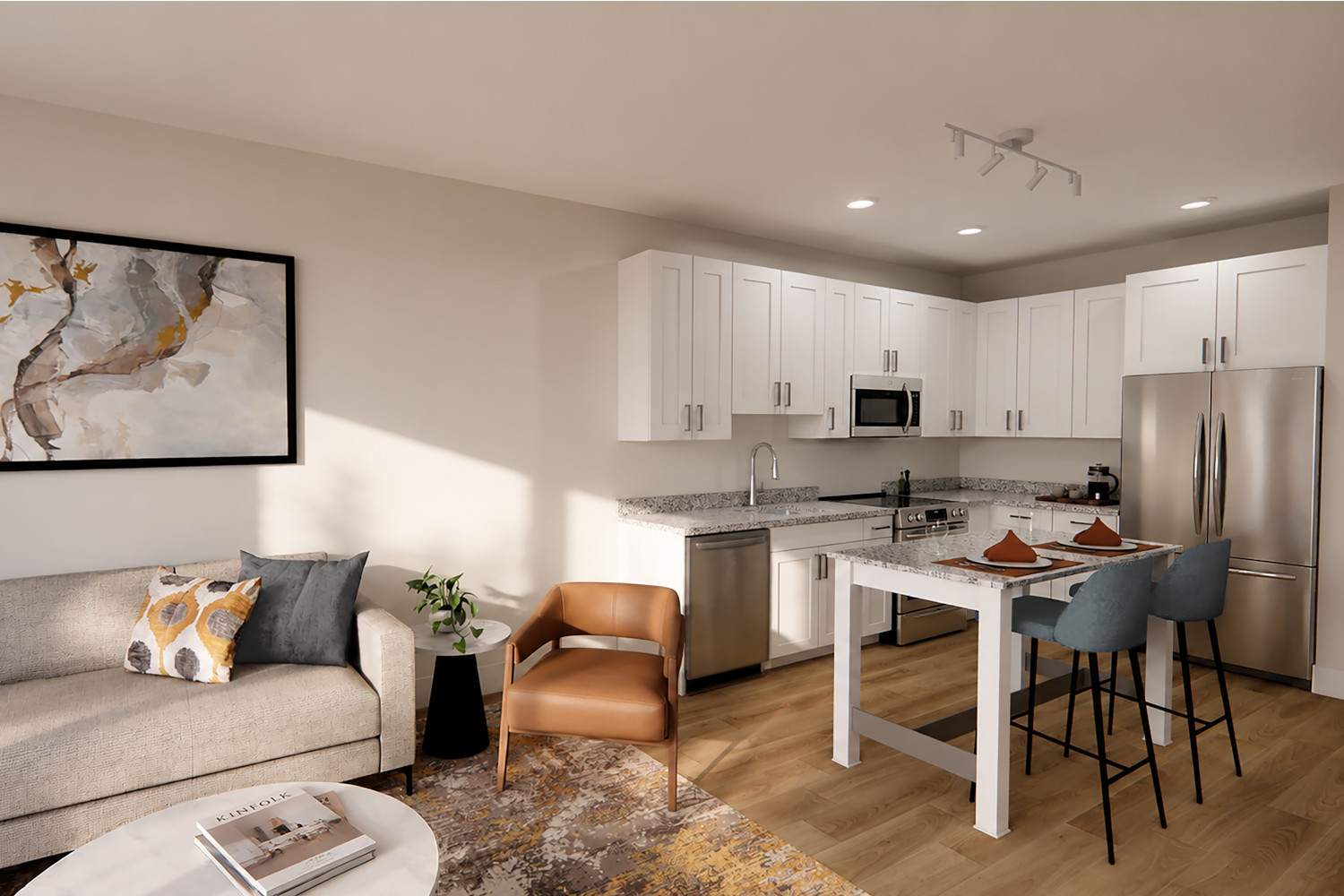 Modern kitchen and living area with light furniture and wooden floors.