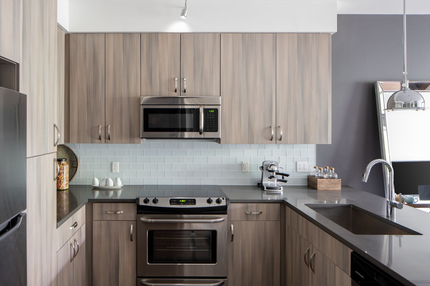 Frigidaire appliances, including slide-in range and refrigerator