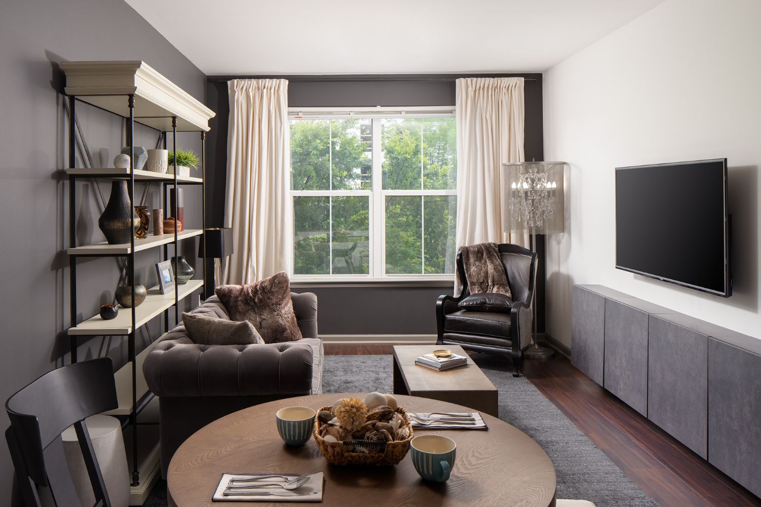 Soaring 6-foot windows with wooded views