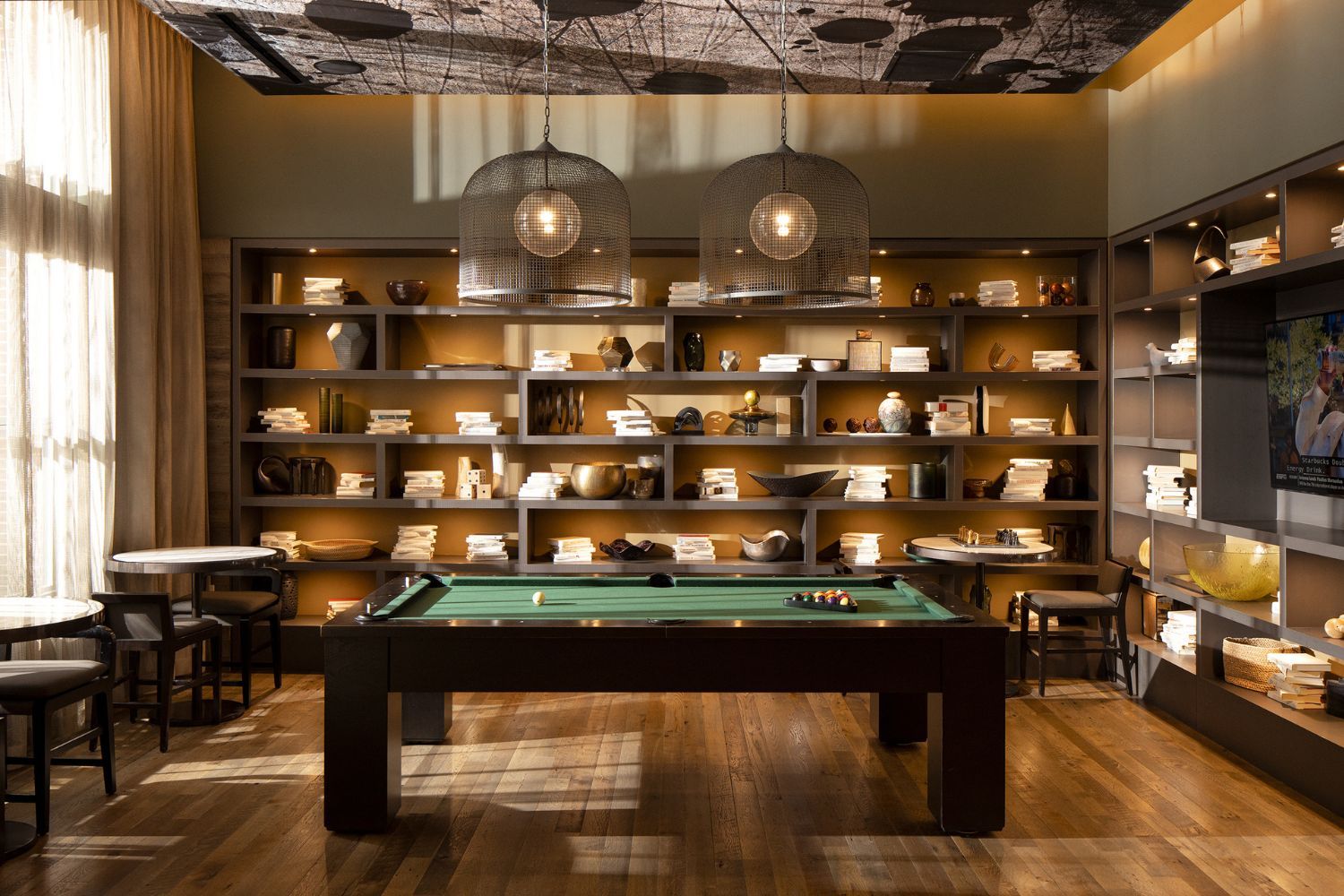 Stately Lobby Lounge with an abundant library and classic billiards table