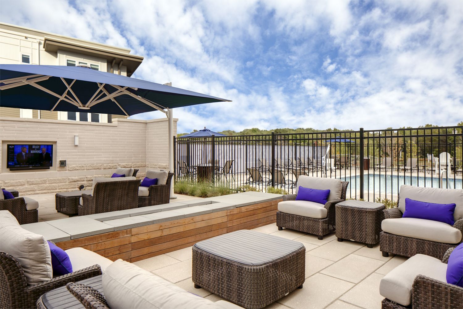 Enjoy a relaxing moment out by the pool lounge.