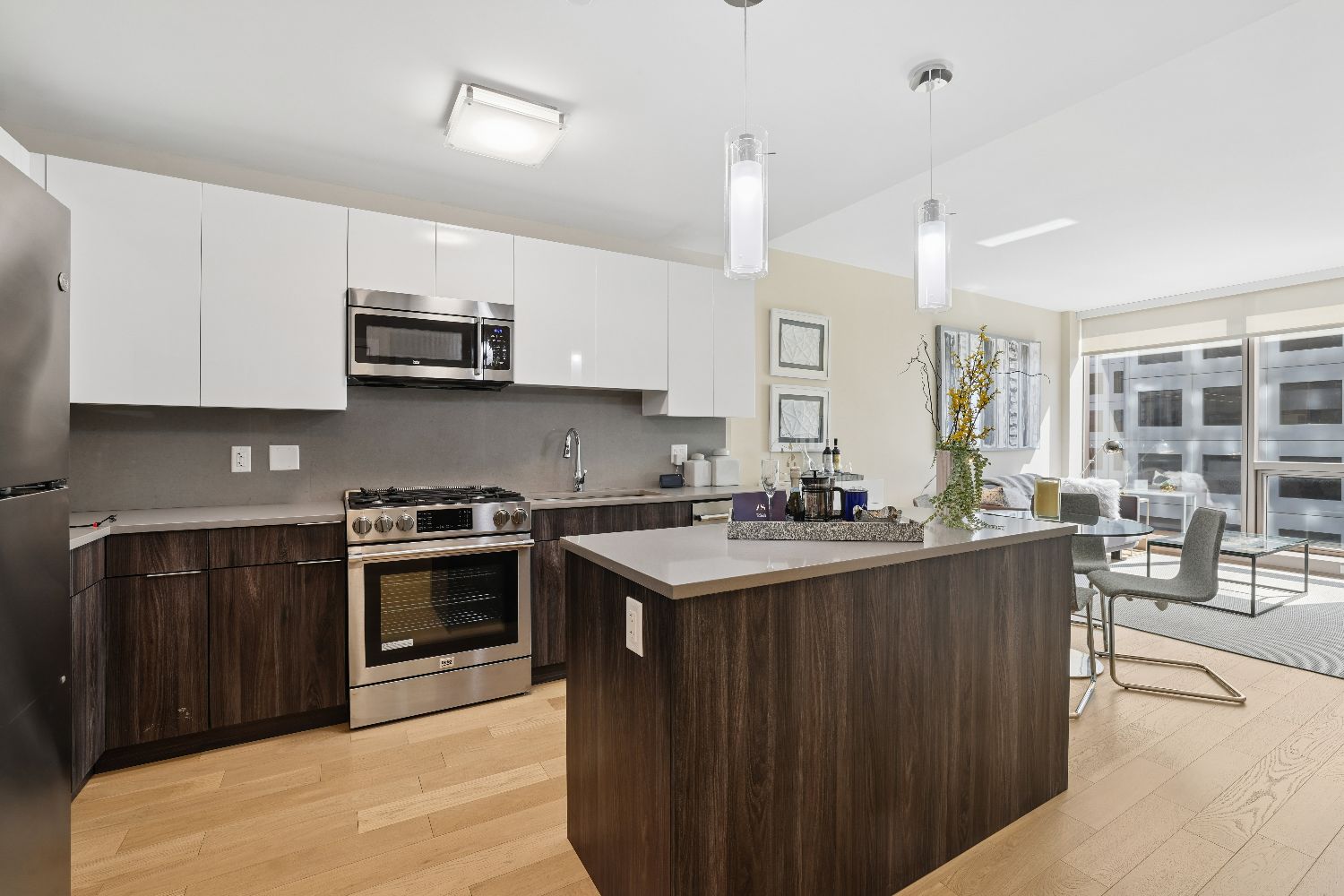 Kitchen with large island and wood cabinetry.