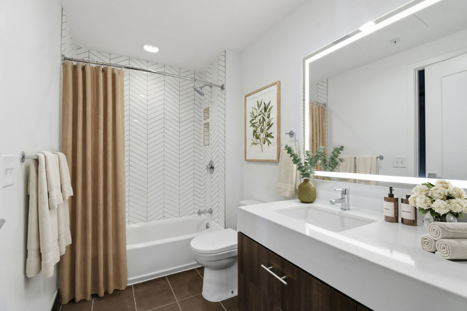 Bathroom with bathtub and tan curtains