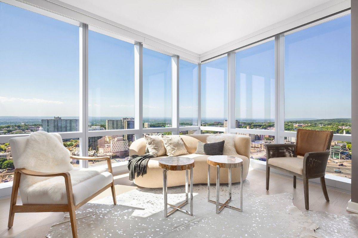 Living room with floor to ceiling windows