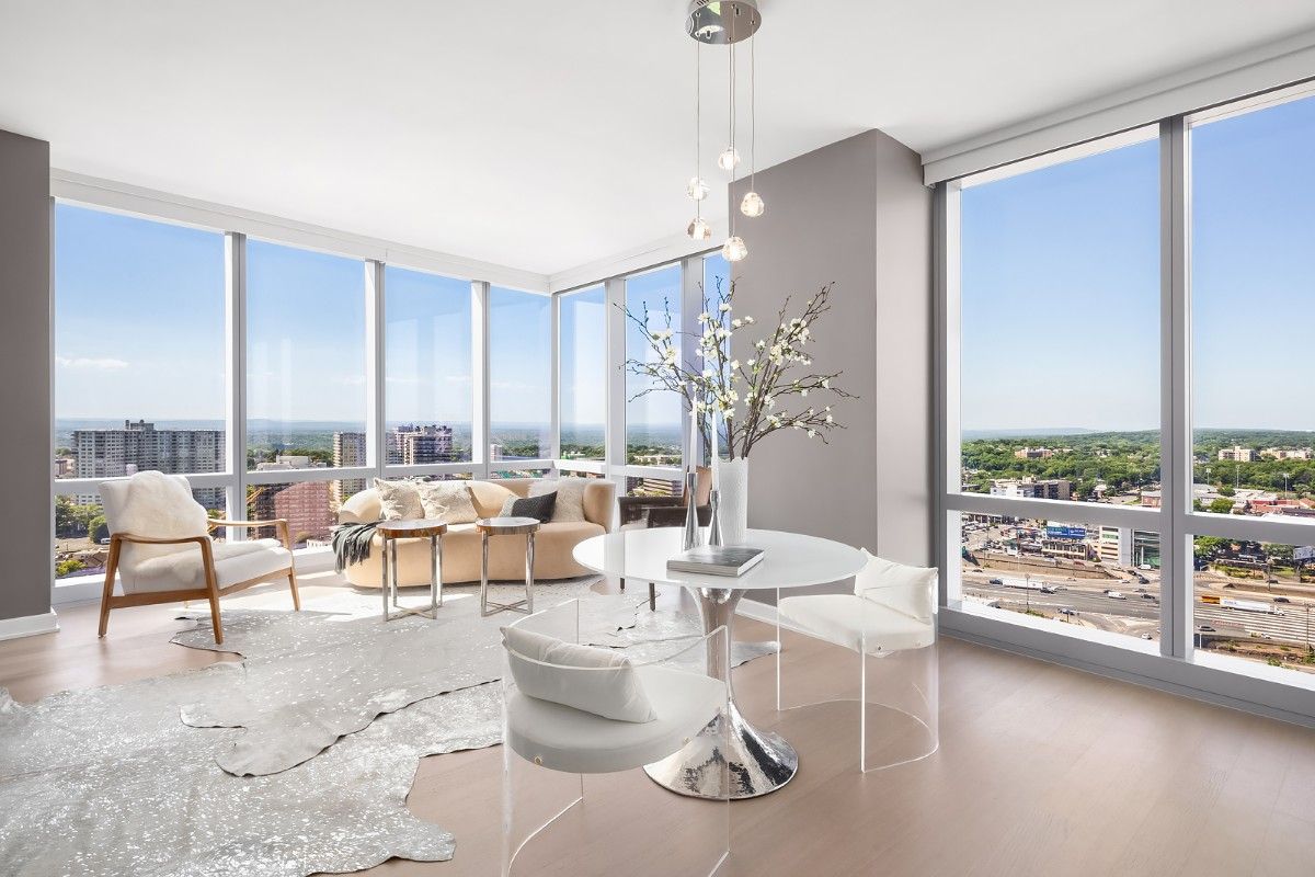 Living room with floor to ceiling windows