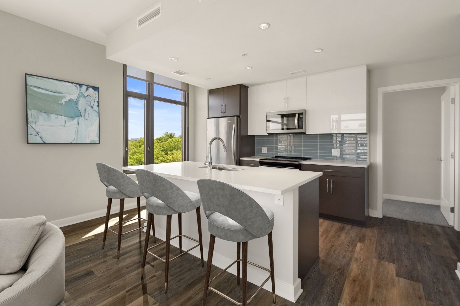 The Lindley features kitchen countertops, backsplashes and cabinetry in 2 styles