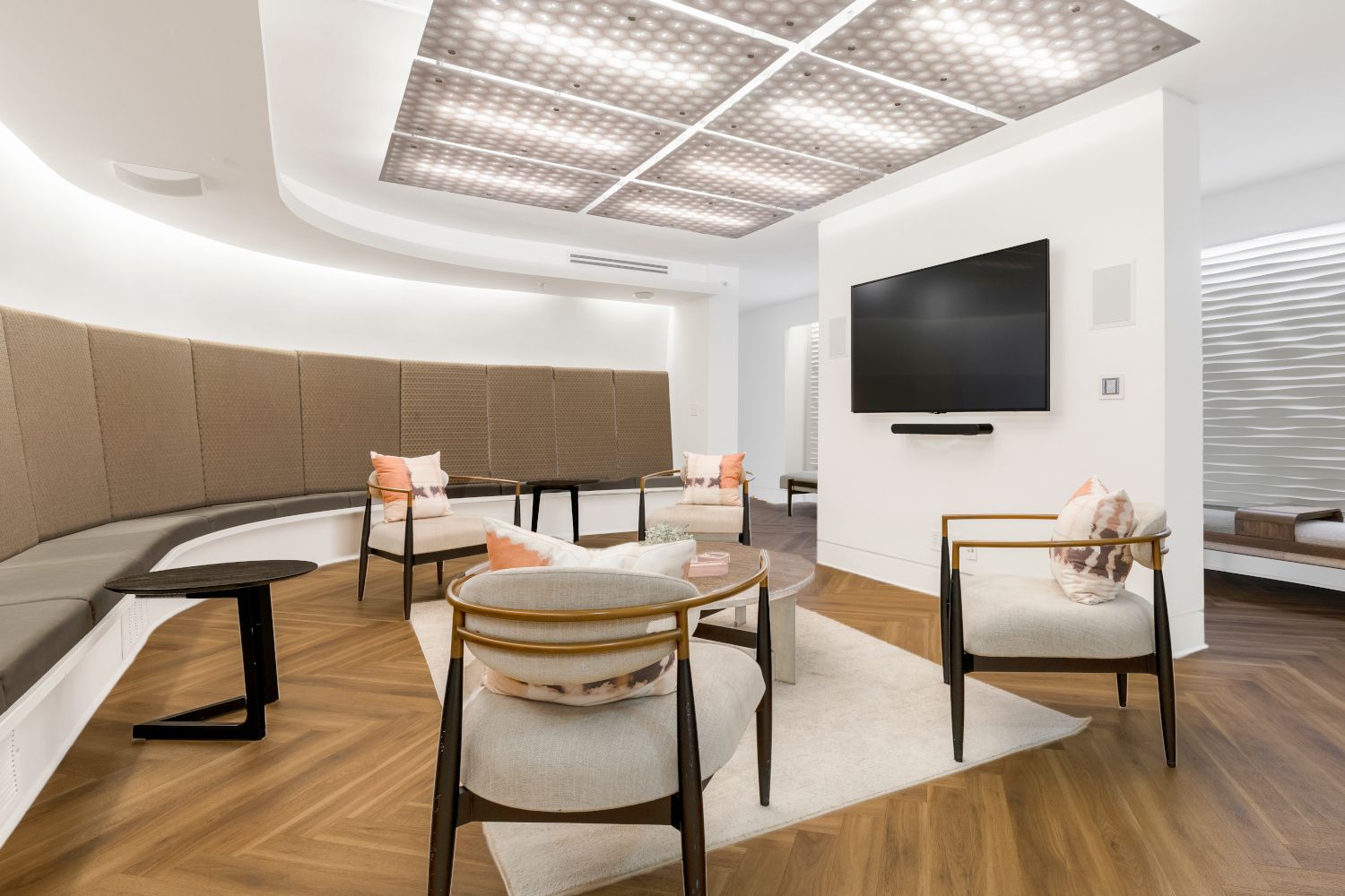 Within the clubroom is a media lounge with comfortable seating and video display.