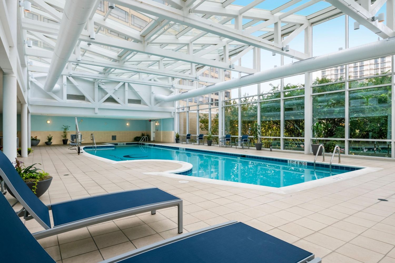 Indoor pool with lounge chairs
