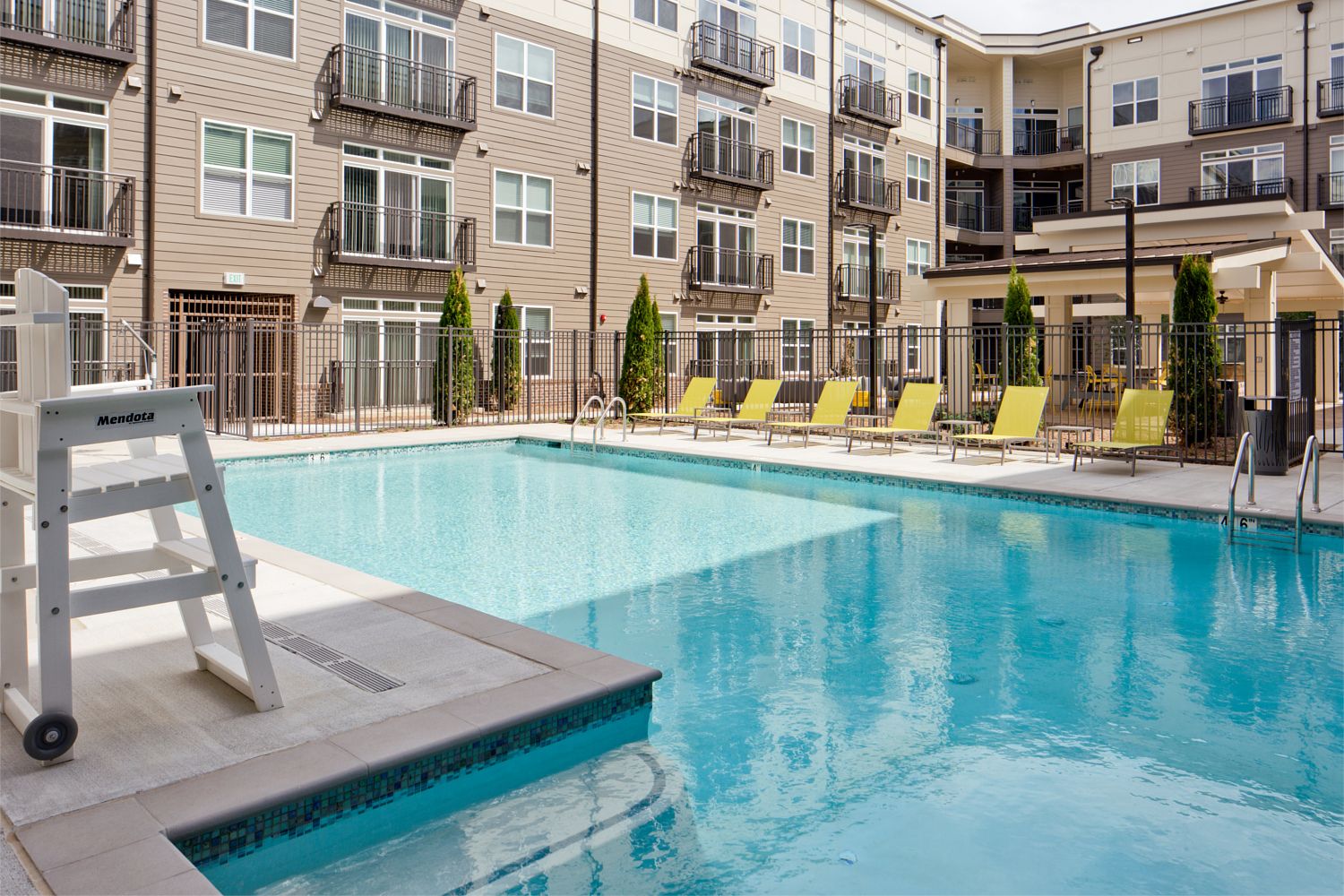 Resort-style outdoor swimming pool.