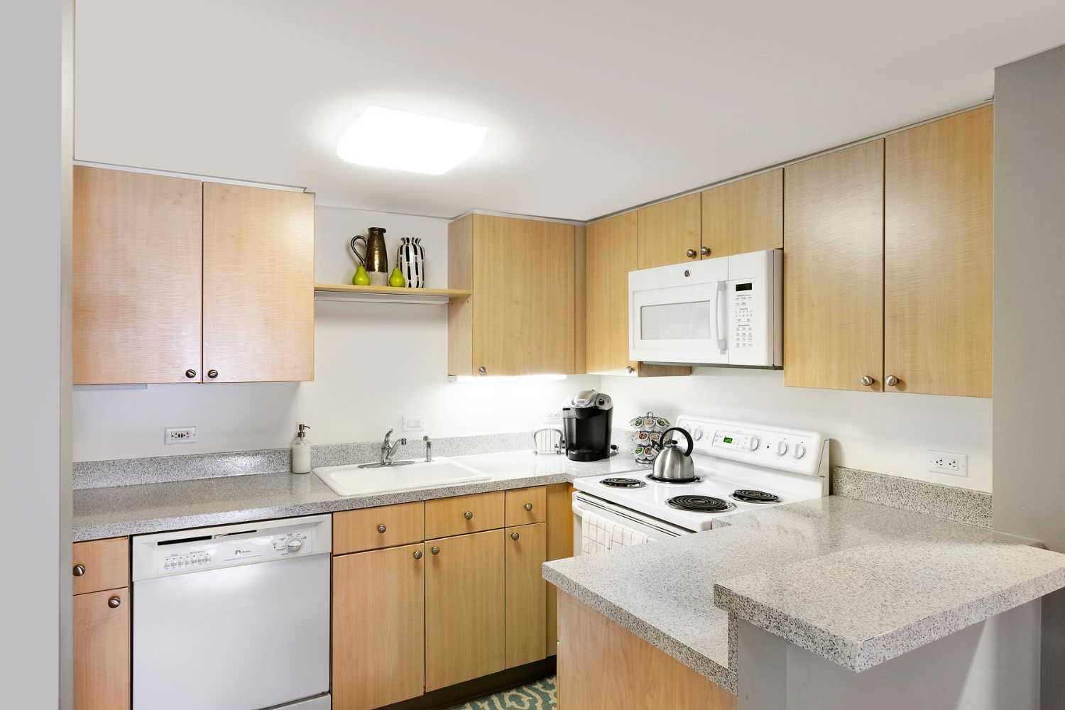 Revel in our open kitchen designs with ample counterspace to cook.