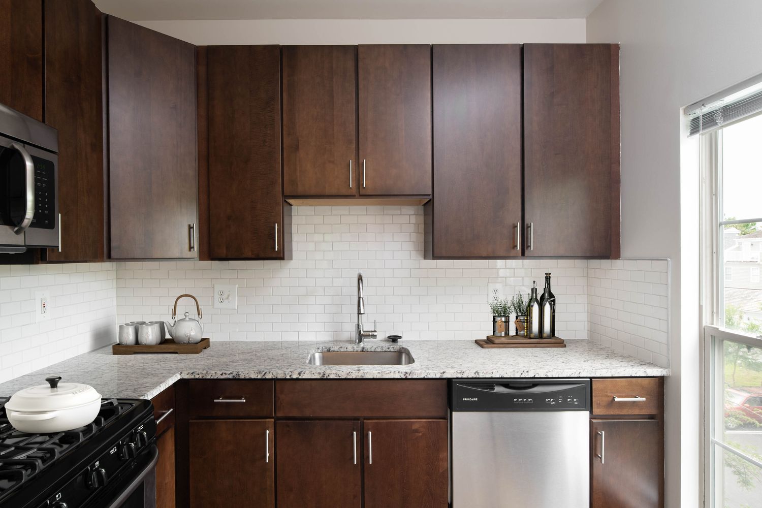 Chef-worthy kitchen with granite countertops and stainless steel appliances