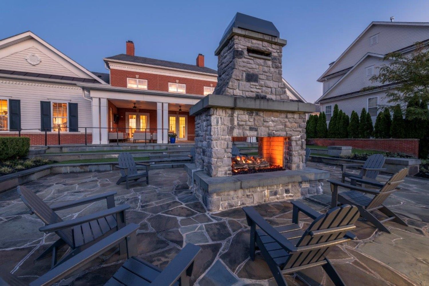 The outdoor fireplace warms up cool nights.