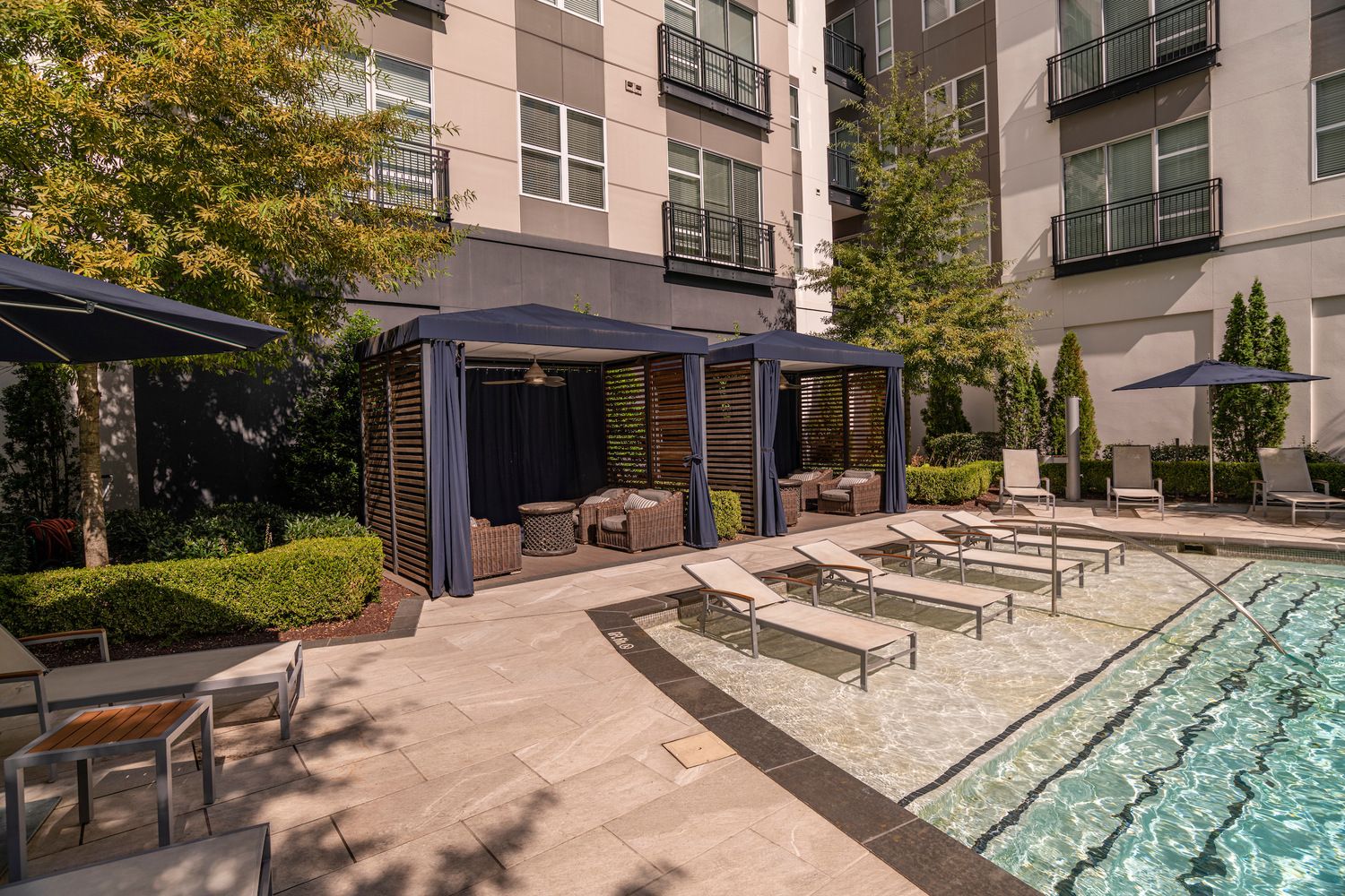 Shady, poolside cabanas