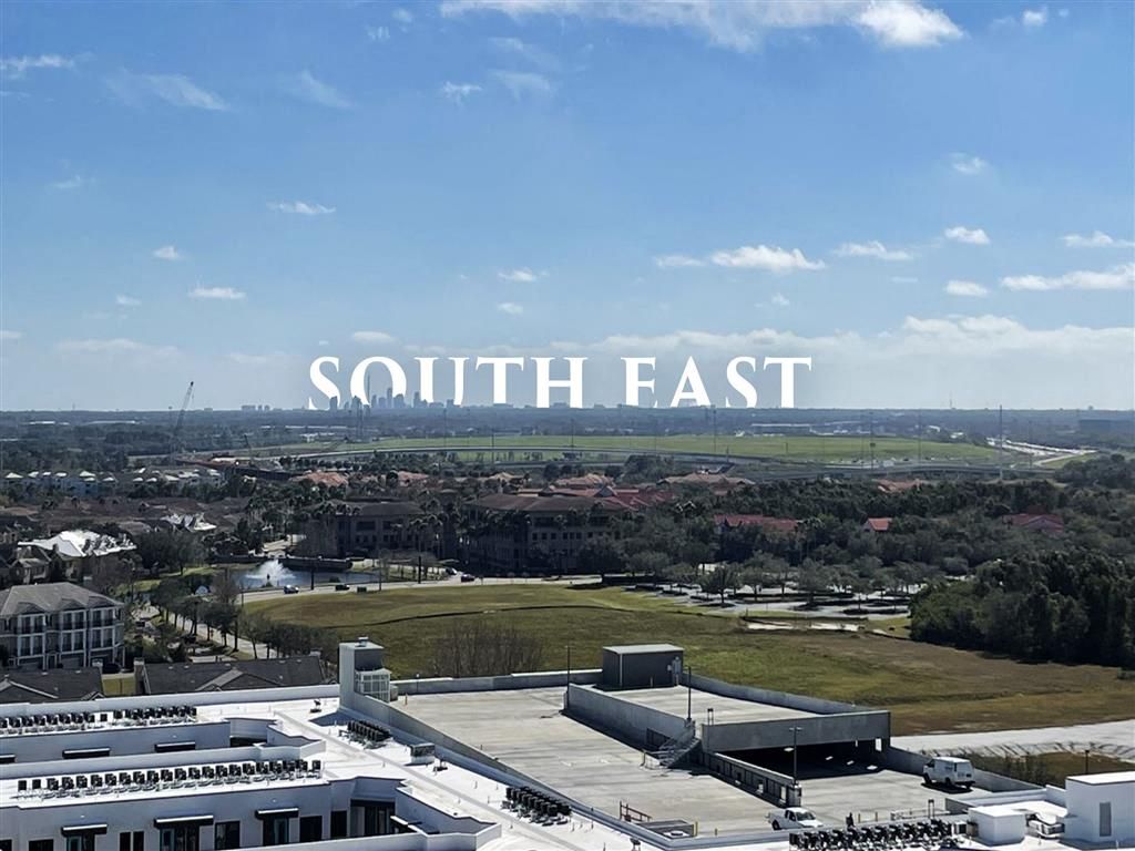 A view of a landscape with the word "SOUTH EAST" prominently displayed above.