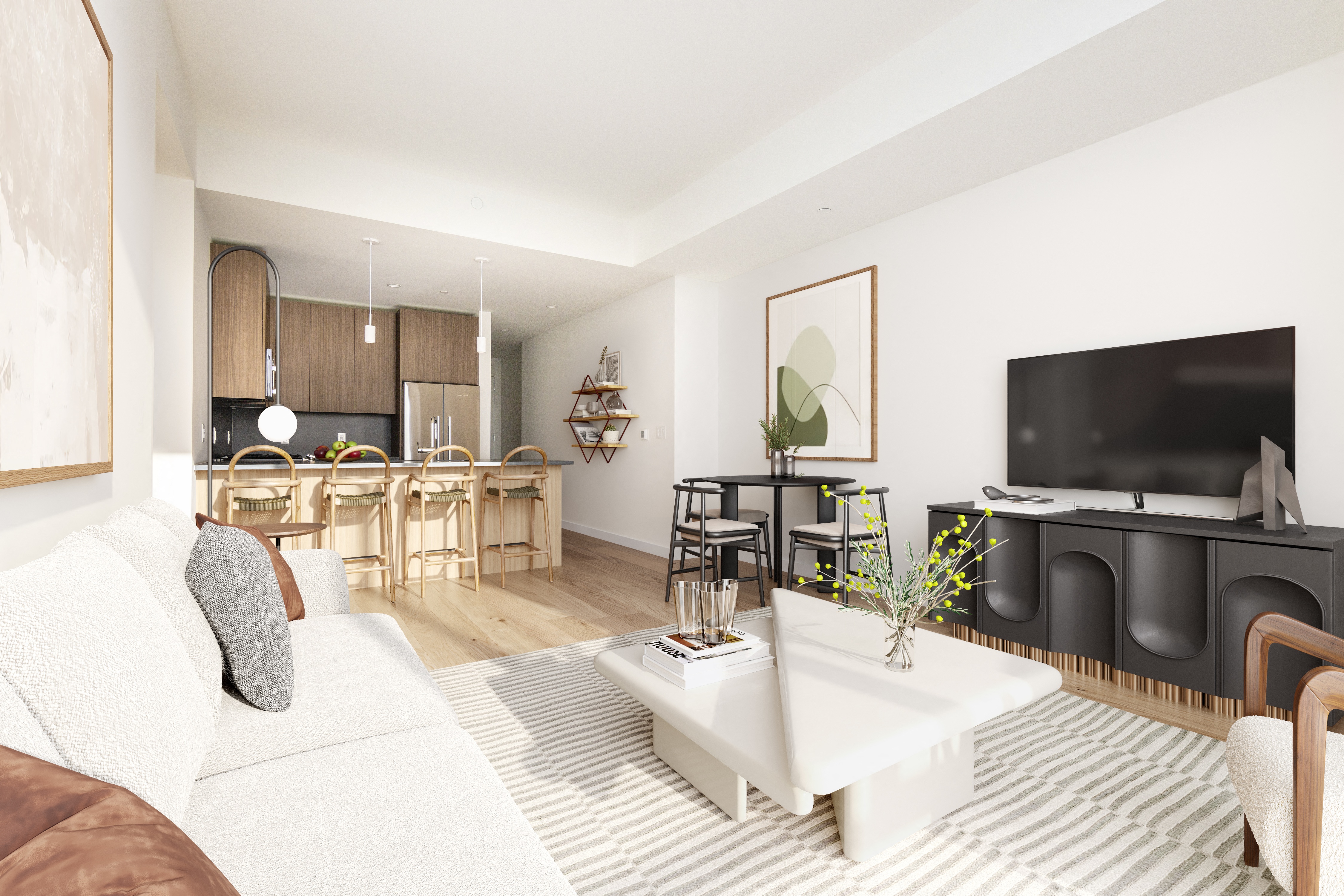 Modern living room and kitchen with light colors and minimal decor.