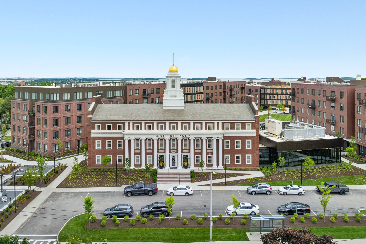 A full-scale perspective of the front entrance and landscaped entryway.