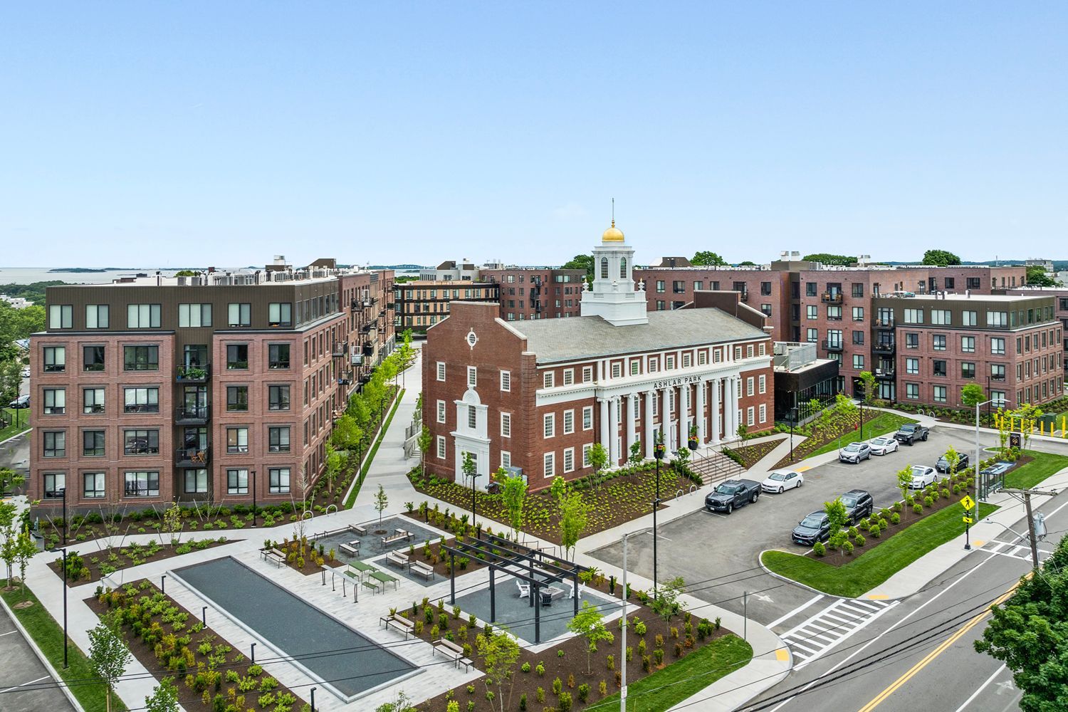 Distant view showing both the corner angle and full building exterior.