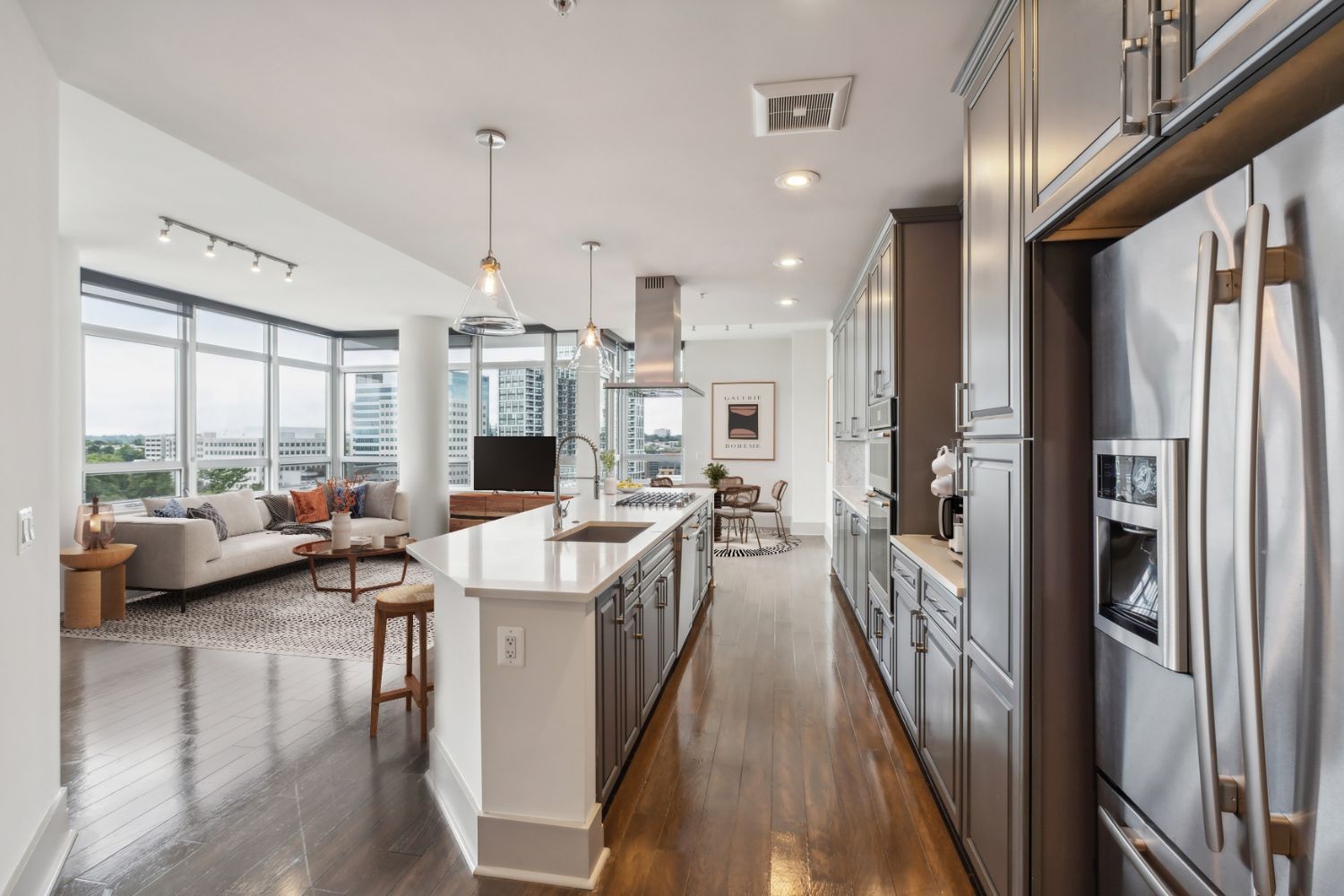Premier cabinetry and hardwood flooring welcome you home.