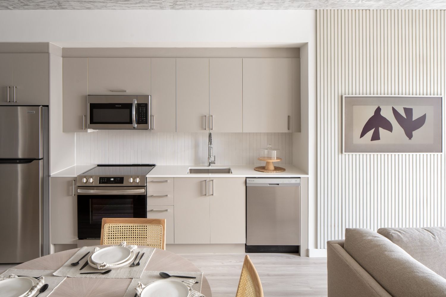 Modern kitchens with quartz countertops and porcelain tile backsplash