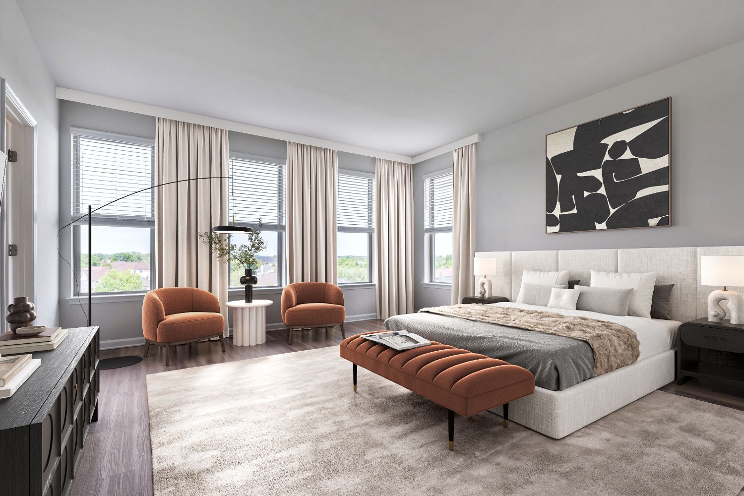 Modern bedroom with a light palette, large windows, and stylish furnishings.