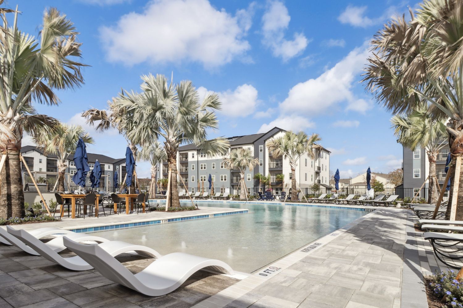 Avida's resort-style pool features an abundance of comfortable seating.