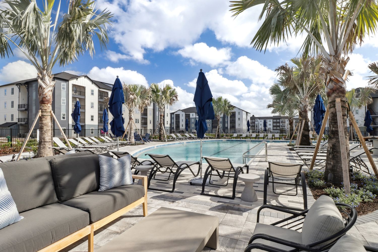 Avida's resort-style pool features an abundance of comfortable seating.