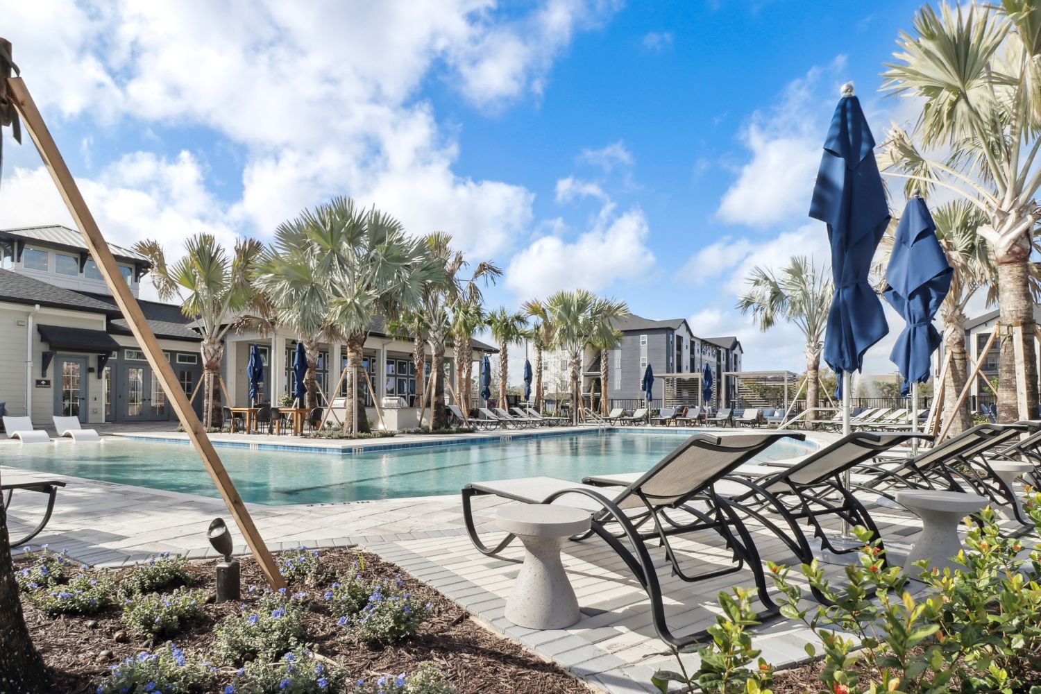Avida's resort-style pool features an abundance of comfortable seating.