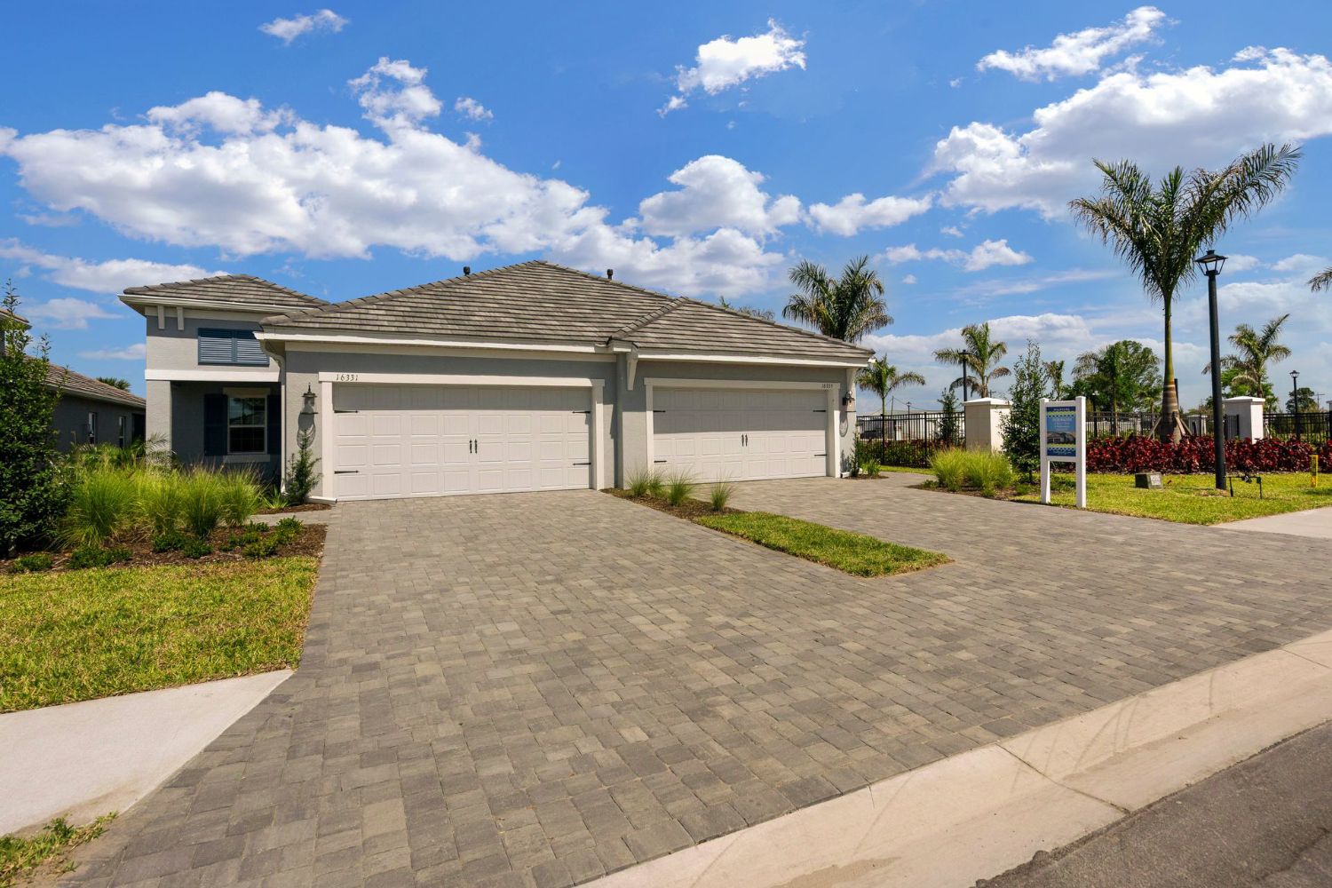 Attached two-car garages with private two-car driveways