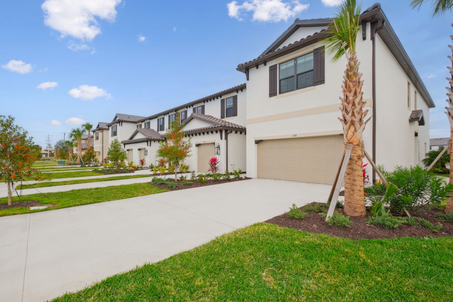 Timelessly appointed two-story townhomes with a Mediterranean influence.