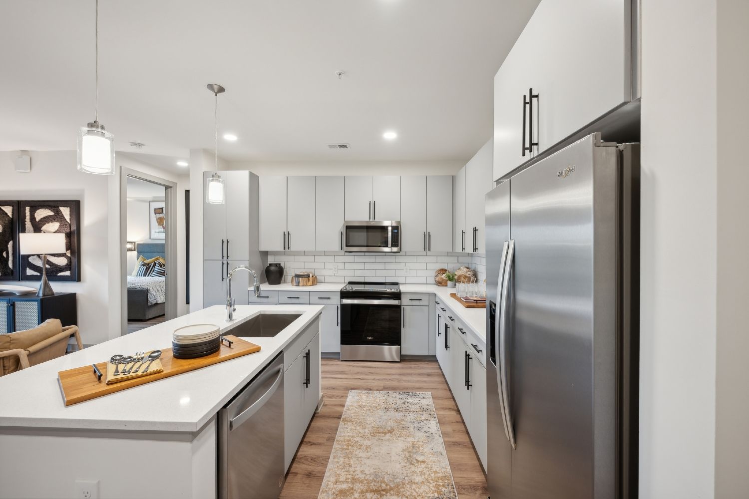 Flat front kitchen cabinets with 42” uppers and tile backsplash