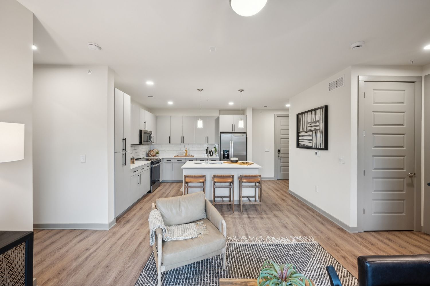 Spacious apartments with wood style flooring throughout