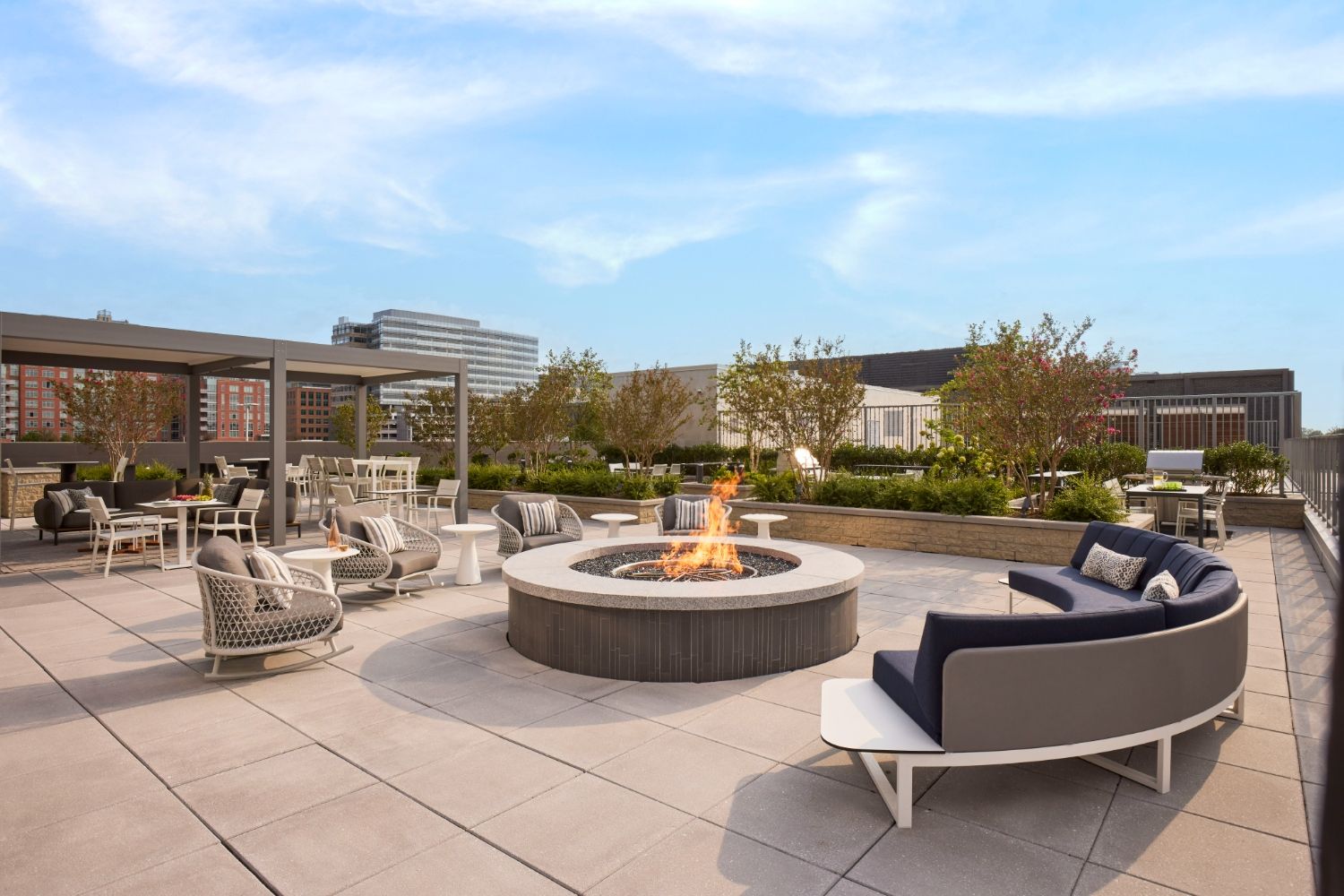 Relax and enjoy good company around the central firepit with unparalleled views of Reston Town Center.