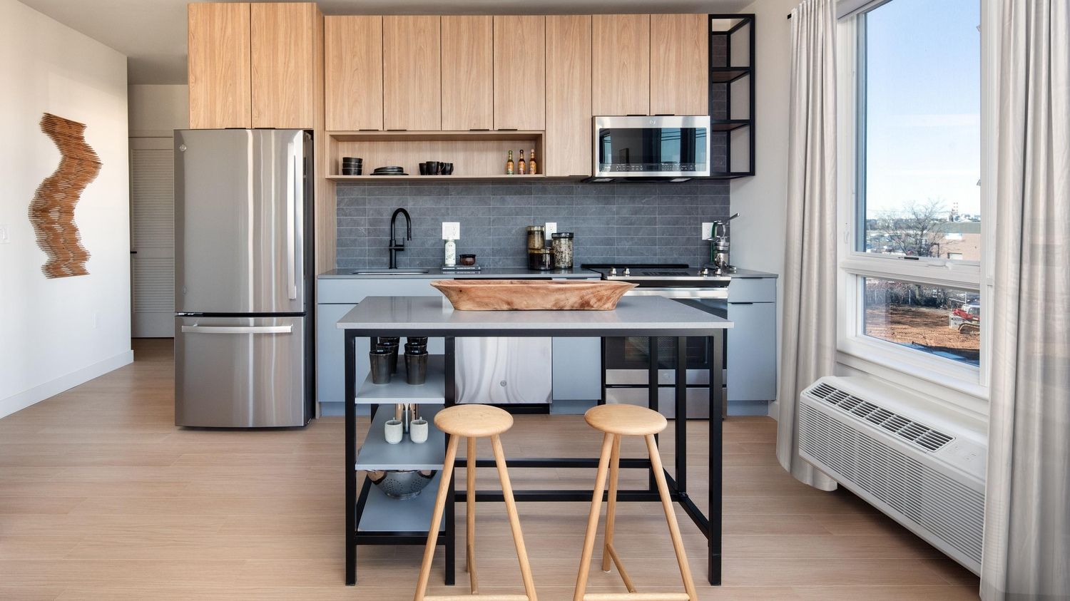 Kitchen with island and stainless steel appliances