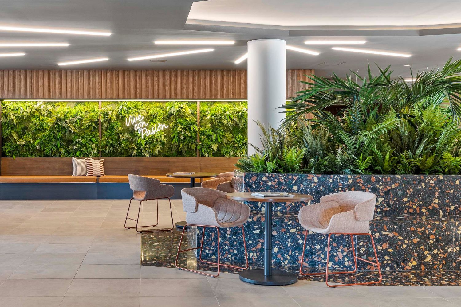 Chef's kitchen and bar seating in the rooftop lounge.