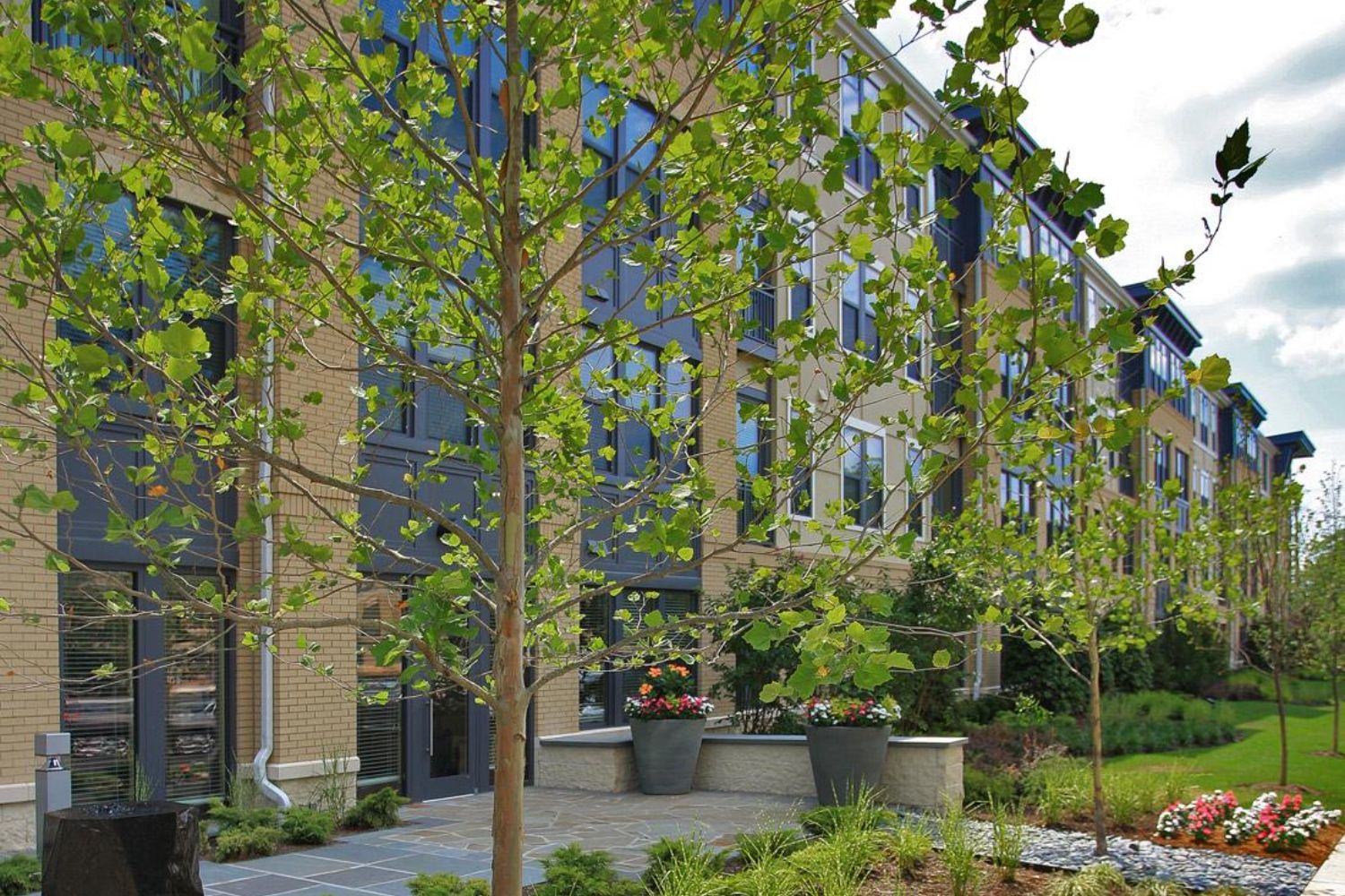 Beautiful landscape architecture invites you to The Alcott