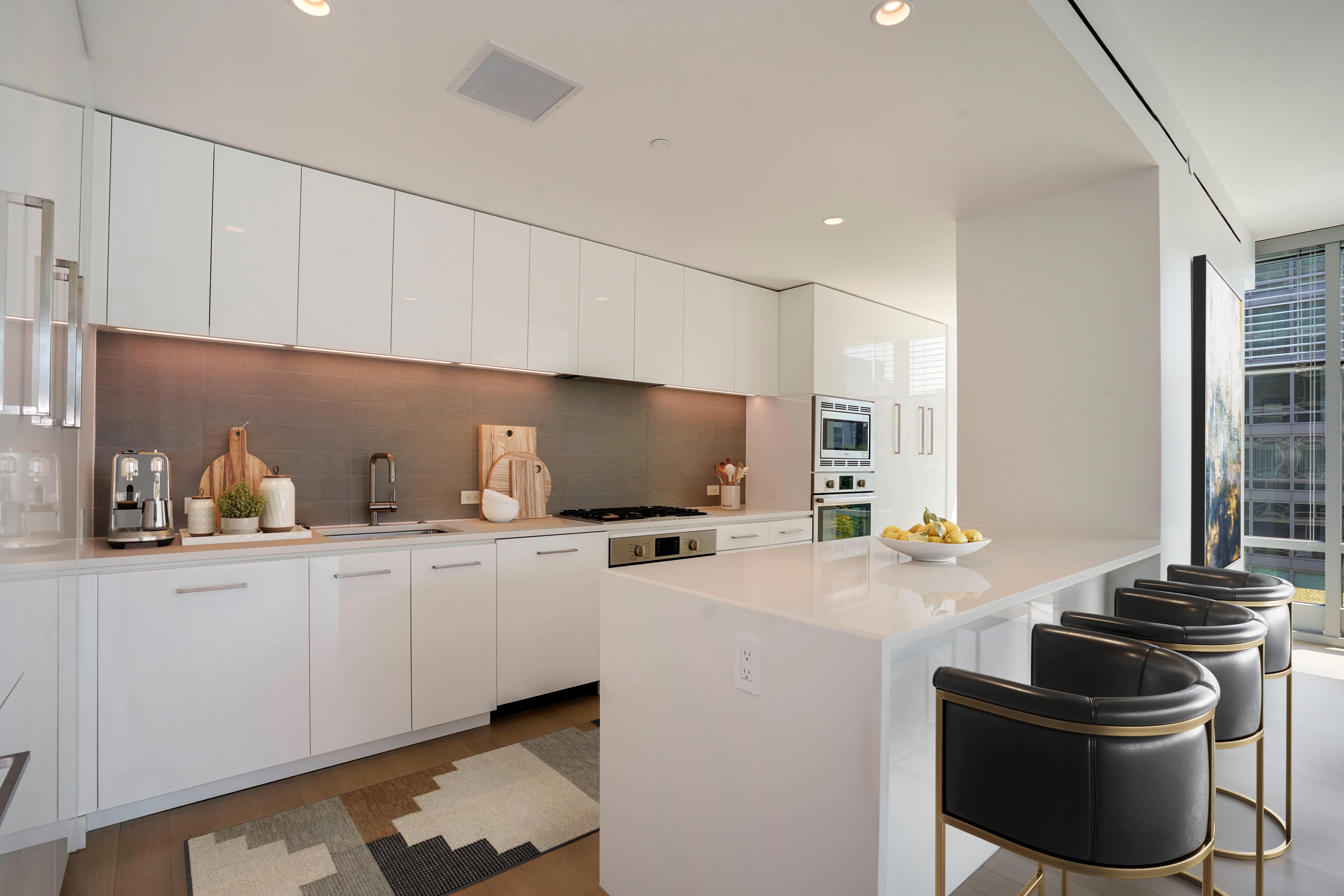 Wide view of expansive kitchen and kitchen island