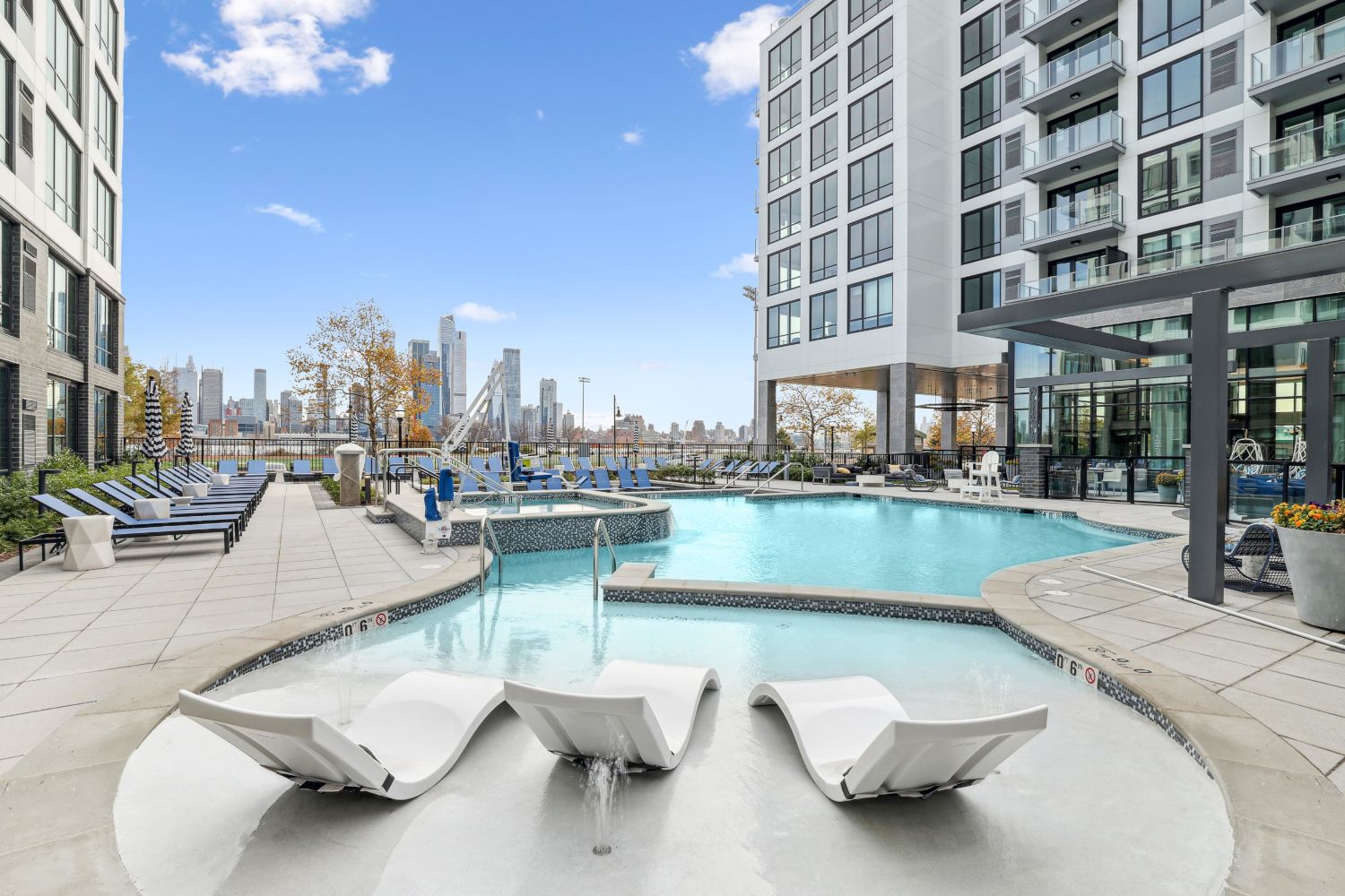 Community pool featuring beach like entry and wading area