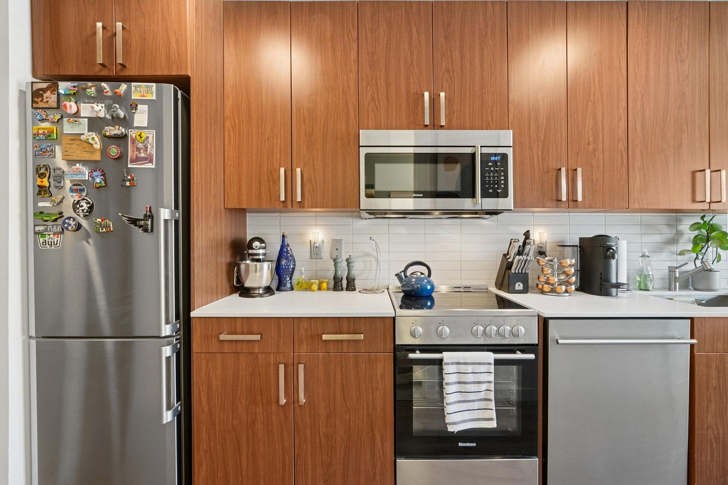A sleek, modern kitchen featuring stainless steel appliances