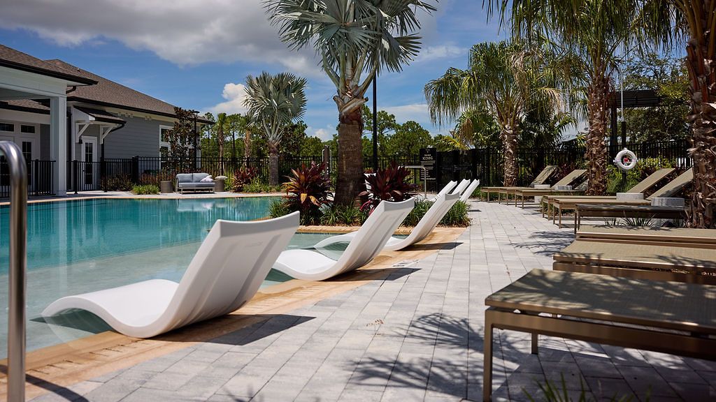 Resort-inspired pool with lounge chairs